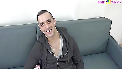 Tattooed guy tries to watch a porn movie that has a homosexual theme